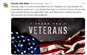 Screenshot of a Charter Oak State College tweet with an image of the American Flag and the words "Thank You Veterans"